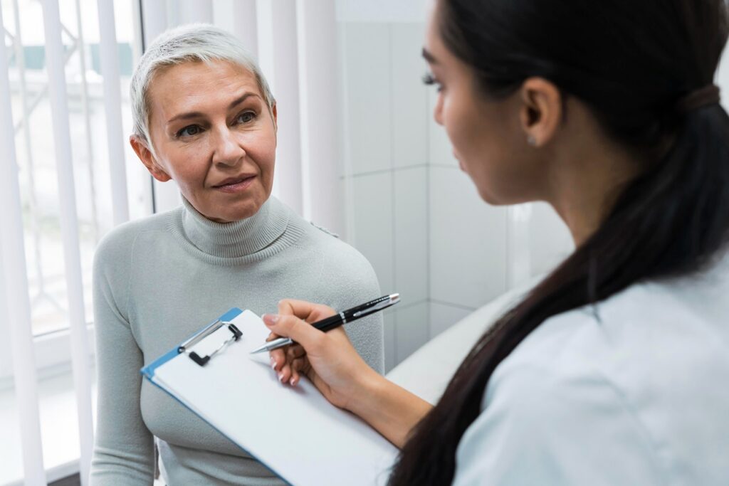 Patient discussing dental implant options with a dentist.