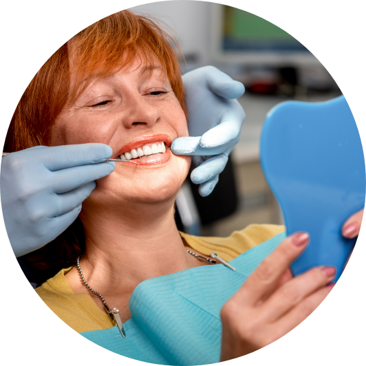 Patient comparing tooth shade.